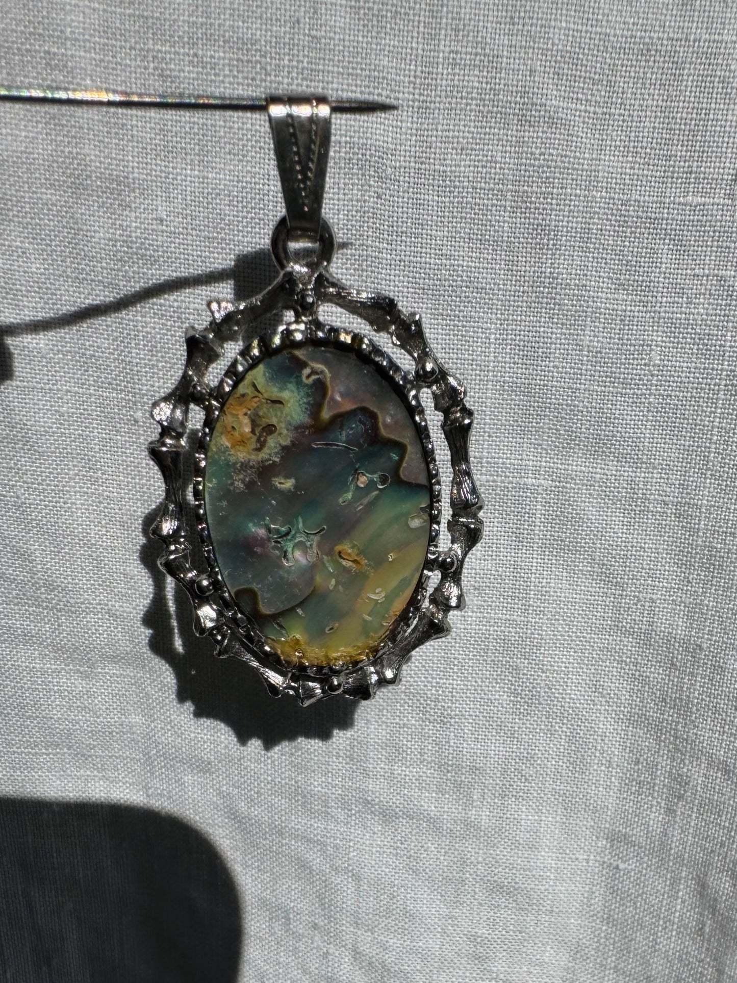 The Siren’s Charm abalone pendant